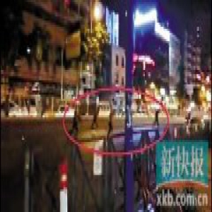 广东警方抓毒贩引发马路枪战 1名疑犯被击毙