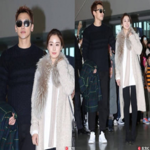 Rain金泰希婚后首露面！伸手护爱妻飞巴厘岛度蜜月