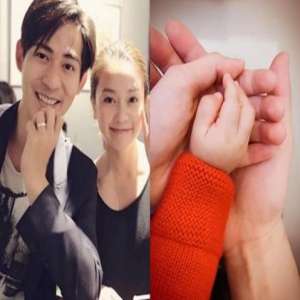 周渝民妻子除夕夜晒合影 一家三口大手托小手(图)