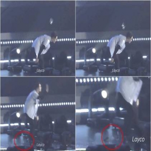 粉丝送礼扔上舞台 张艺兴弯腰差一点被砸中