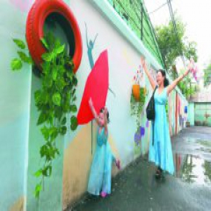 社区主动“吹哨” 安贞旧围墙成了“网红墙”